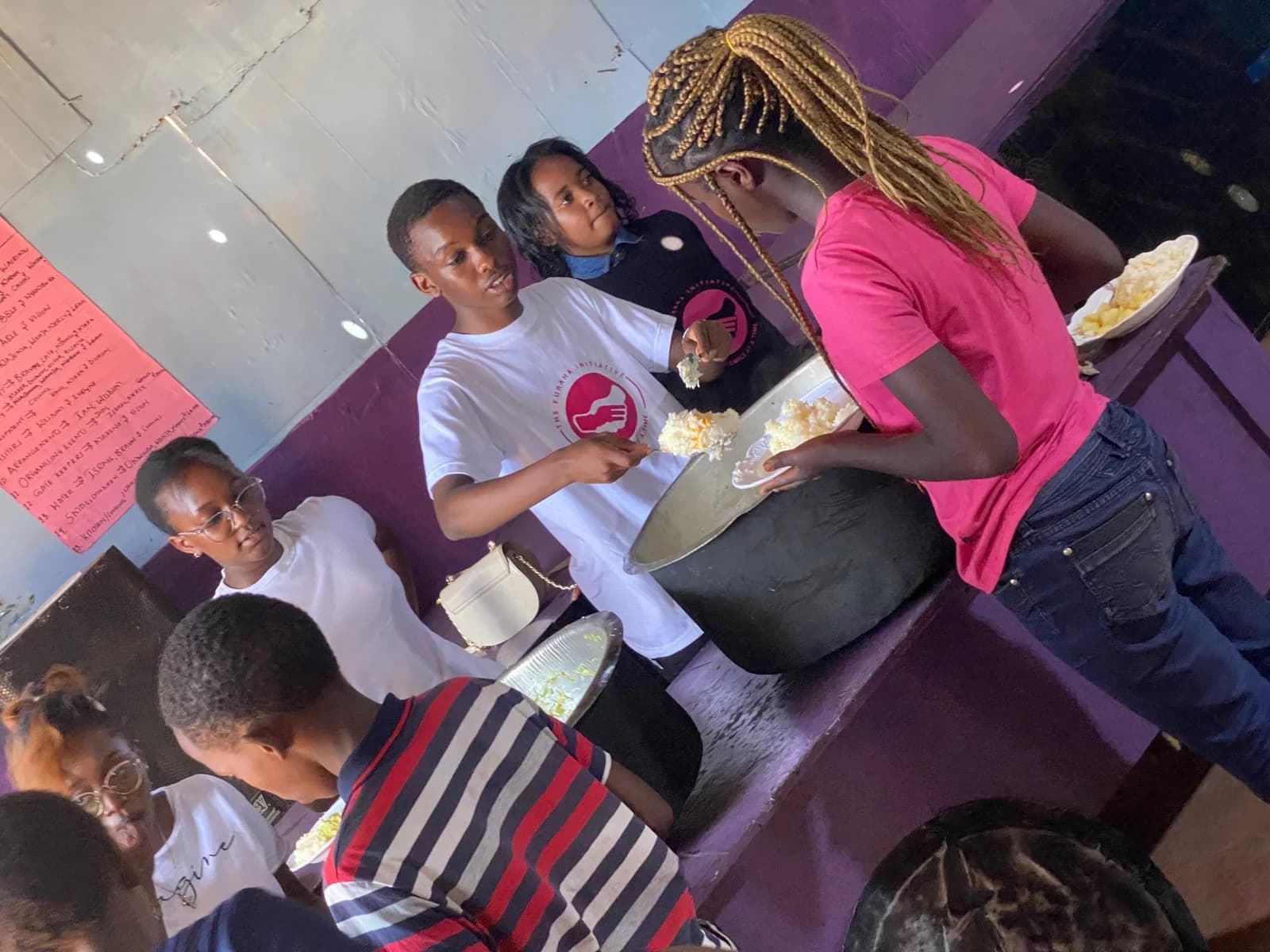 Furaha volunteers and community members spending time together