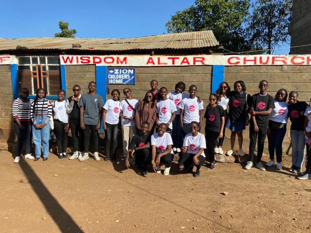 Furaha volunteers and community members spending time together